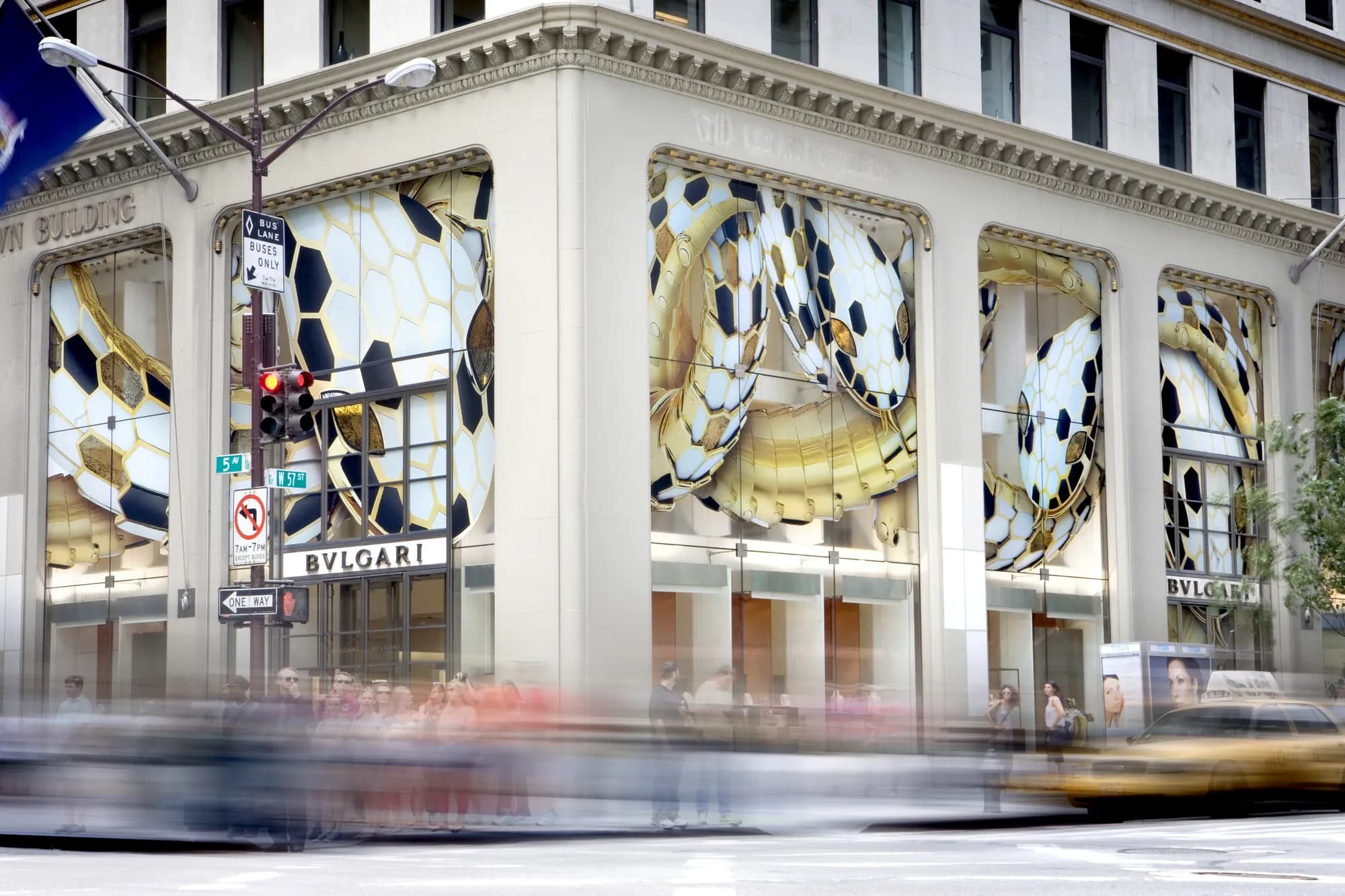 Bulgari flagship corner dressed in Serpenti scale window graphics along both facades