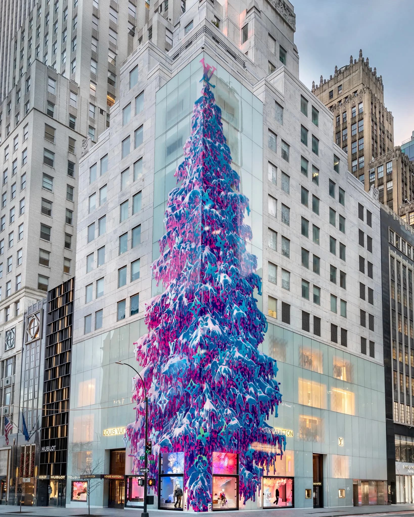 Louis Vuitton holiday 2020 facade with a cascading tree of purple and blue monogram forms