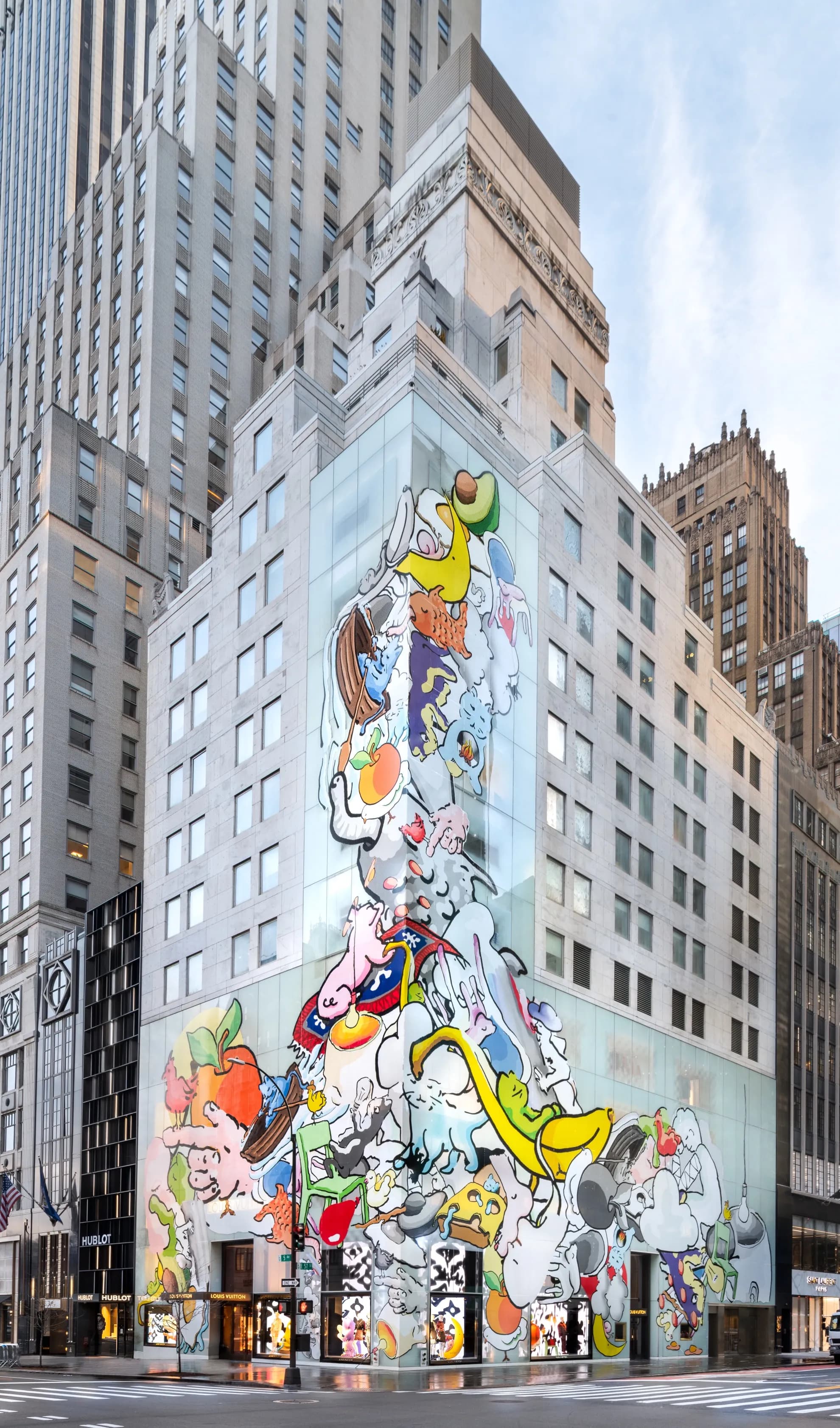 Louis Vuitton building wrapped in colorful Urs Fischer collaboration artwork