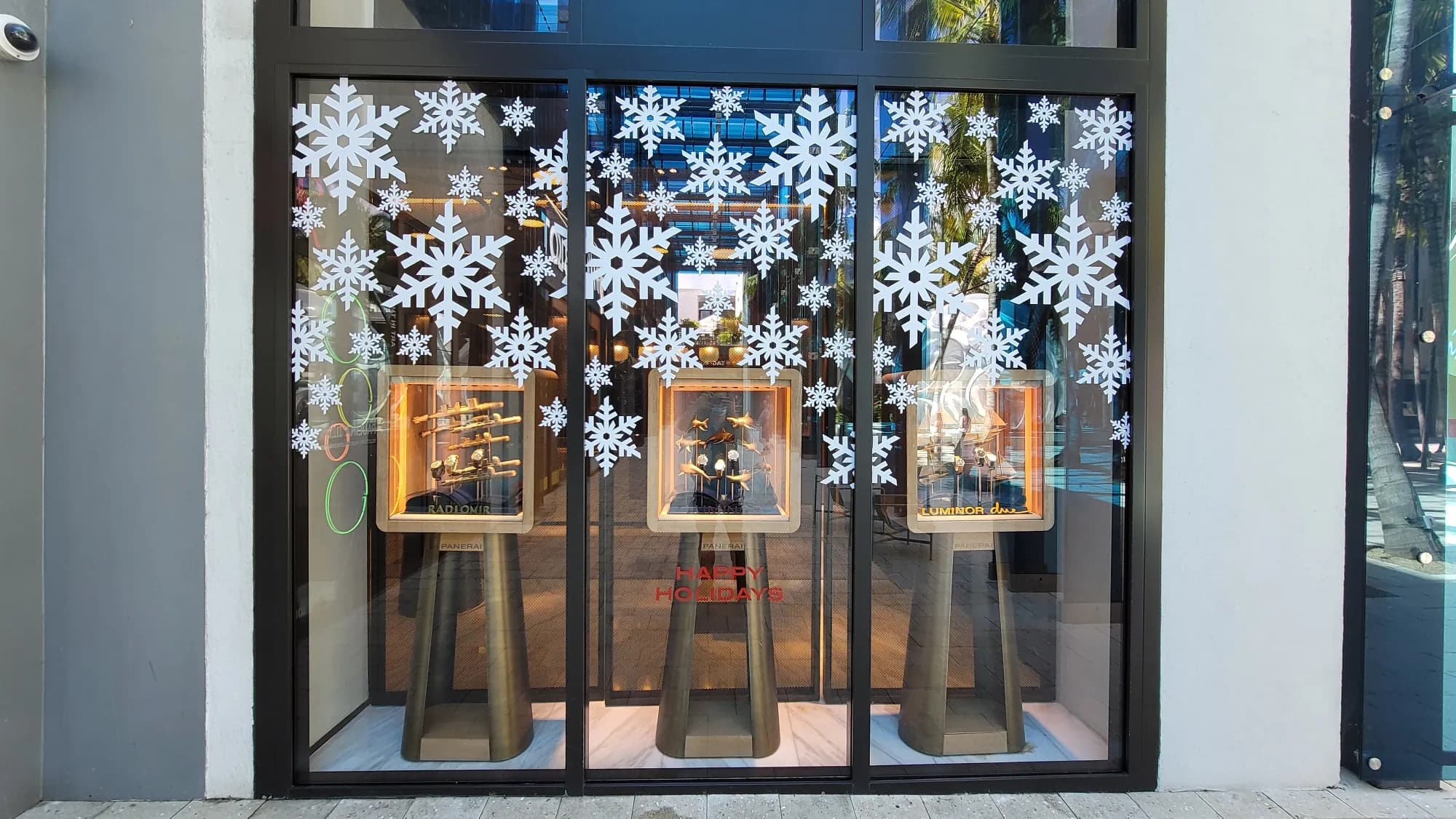 Panerai Miami Design District storefront with white snowflake vinyl across the windows