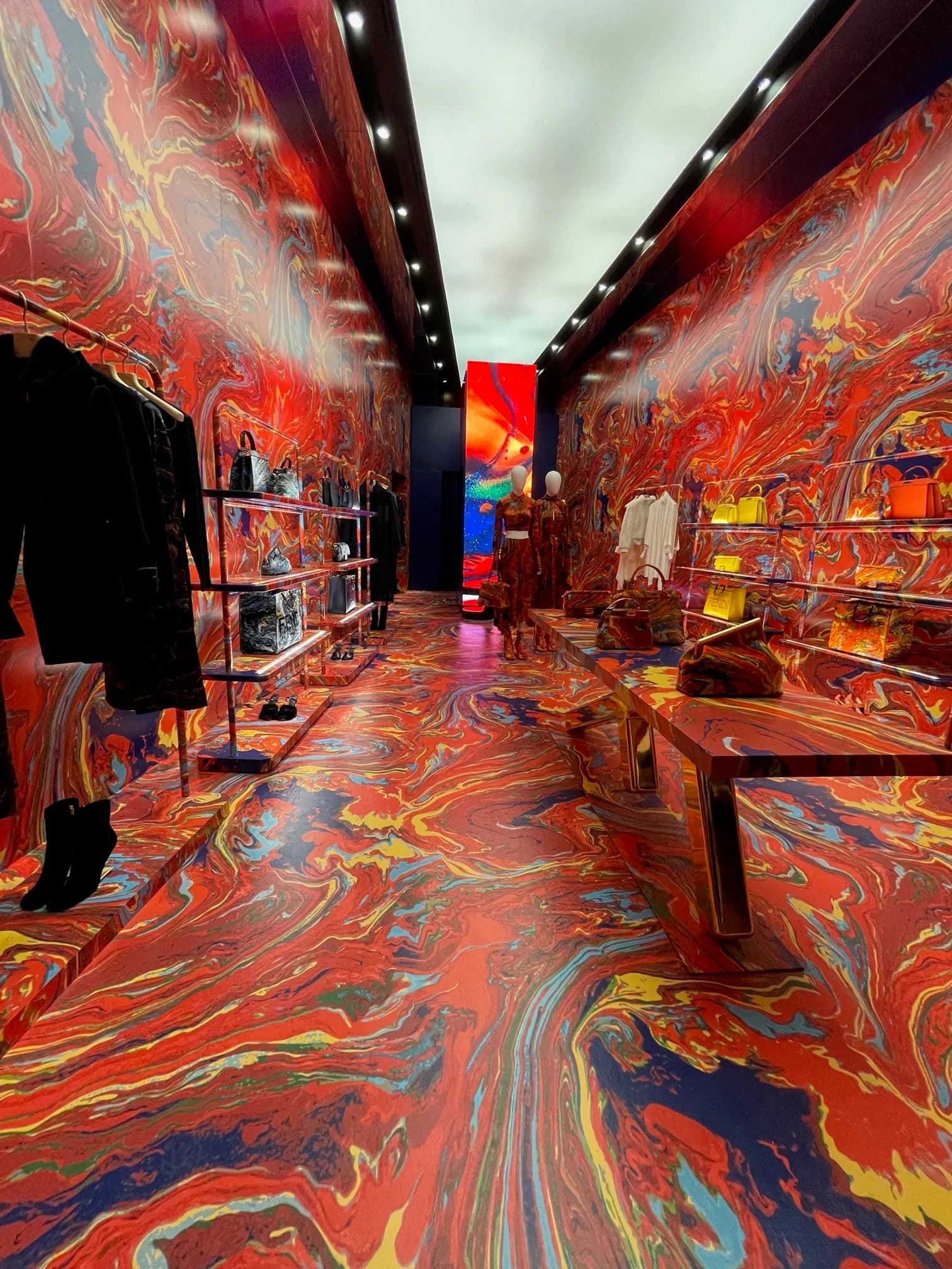 Fendi pop-up in the Miami Design District, its floor, walls and fixtures wrapped in red marbled print